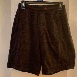 Lululemon pace breaker 9” size medium. Black with grey print